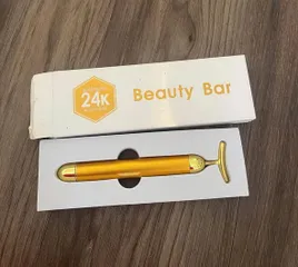 Thanh lăn massage mặt Suolaer 24K – làm săn da