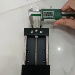 bàn trượt nhôm trượt tròn phi vít me cơ 0601 hành trình 100