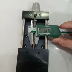 bàn trượt nhôm trượt tròn phi vít me cơ 0601 hành trình 100