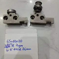 cụm bi tì căng dây đai cài vị trí  vòng bi kèm pad nhôm thép gạt cell pin tì phôi ép vật liệu