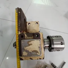 11kg cụm đầu trục mặt bích mâm cặp 80 kèm chấu trái thông lỗ 16 chế khoan phay mài trục A B