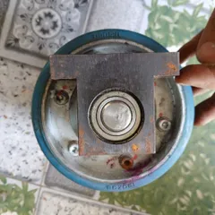 cụm trục xoay nansin 130x33 tháo máy nhựa pu mài băng nhám dẫn phôi