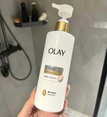 (Hàng nhập khẩu) Sữa dưỡng thể sáng da Olay Whitening Niacinamide & Vitamin C 260g