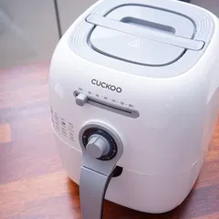 Nồi Chiên Không Dầu Cuckoo CAF-C0510DW 2.9L - Công Suất 1400W, Chống Dính, Tối Ưu Nhiệt Độ, Thiết Kế Hiện Đại, Dễ Dàng Vệ Sinh