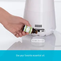 Máy tạo ẩm và khuếch tán tinh dầu HoMedics UHE-WM10 - Chế độ phun sương ấm/lạnh, dung tích 2L, điều khiển từ xa, sử dụng 25h, tắt tự động.