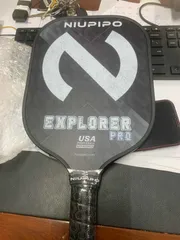 Ảnh đánh giá Vợt Pickleball Niupipo Explorer Pro Graphite N-01 - Thiết Kế Tinh Tế, Độ Bền Cao, Hoàn Hảo cho Người Chơi Chuyên Nghiệp
