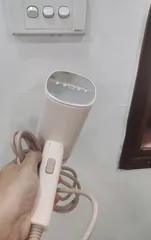 Ảnh đánh giá Bàn là hơi nước cầm tay gấp gọn Seka SK547 - Công suất lớn 1200W, 7 vòi phun, khử trùng hiệu quả, nhẹ và dễ sử dụng