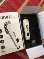 Ảnh đánh giá Tông đơ cắt tóc chuyên nghiệp Kemei 809 - Bộ 4 răng lược cao cấp, thiết kế nhỏ gọn, cắt tỉa dễ dàng tại nhà cho bé