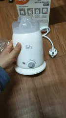 Ảnh đánh giá Máy hâm sữa FatzBaby FB3002SL 4 chức năng - Tiệt trùng, giữ nóng, hâm sữa, vắt cam cho bé - Sản phẩm tiện lợi cho mẹ và bé