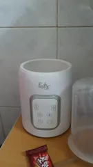 Ảnh đánh giá Máy Hâm Sữa và Tiệt Trùng Điện Tử Fatzbaby Mono 7 FB3010TN - 4 Trong 1, An Toàn, Tiện Lợi Cho Mẹ Và Bé