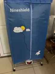 Ảnh đánh giá Tủ Sấy Quần Áo Nineshield KB006 1300W Có Điều Khiển Từ Xa - Sấy Nhanh, Tiết Kiệm Điện, Đảm Bảo Mùi Hương Tươi Mát