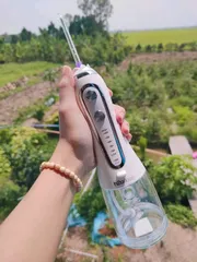 Ảnh đánh giá Máy tăm nước cầm tay H2ofloss HF6P phiên bản mới - Thiết bị chăm sóc răng miệng với 5 chế độ áp lực, chống nước IPX7, pin 2500mAh