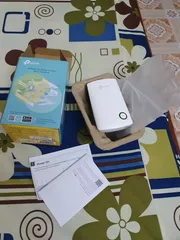 Ảnh đánh giá Bộ mở rộng sóng Wi-Fi TP-Link TL-WA854RE - Tốc độ 300Mbps, Tăng cường tín hiệu và giảm nhiễu Wi-Fi cho nhà và văn phòng