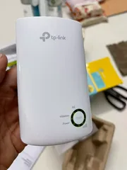 Ảnh đánh giá Bộ mở rộng sóng Wi-Fi TP-Link TL-WA854RE - Tốc độ 300Mbps, Tăng cường tín hiệu và giảm nhiễu Wi-Fi cho nhà và văn phòng
