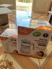 Ảnh đánh giá Máy hâm sữa FatzBaby FB3002SL 4 chức năng - Tiệt trùng, giữ nóng, hâm sữa, vắt cam cho bé - Sản phẩm tiện lợi cho mẹ và bé