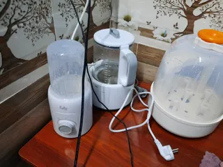 Ảnh đánh giá Máy hâm sữa và tiệt trùng Fatzbaby Mono 6 FB3001TN - 4 chức năng, tiết kiệm điện, thiết kế thông minh, phù hợp với mọi loại bình sữa.