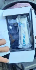 Ảnh đánh giá Tông đơ cắt tóc chuyên nghiệp Kemei 809 - Bộ 4 răng lược cao cấp, thiết kế nhỏ gọn, cắt tỉa dễ dàng tại nhà cho bé