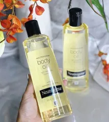 Dầu dưỡng thể Neutrogena Body Oil Sesame Formula 250ml dưỡng ẩm mịn da 🏷️ Giá rẻ vô đối