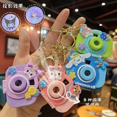 Móc khóa máy ảnh chiếu Mini hoạt hình dạ quang cho trẻ em