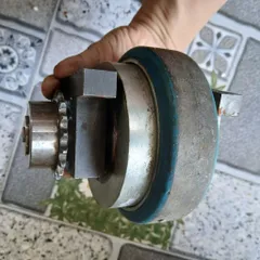 cụm trục xoay nansin 130x33 tháo máy nhựa pu mài băng nhám dẫn phôi