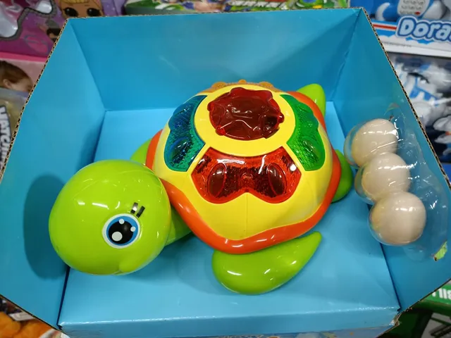 Đồ Chơi Con Rùa Đẻ Trứng Funny Tortoise Chạy Pin Có Đèn Âm Thanh - Quà Tặng Trẻ Em Thú Vị và Độc Đáo