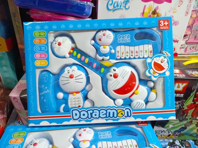 Bộ Đồ Chơi Đàn Guitar 3in1 Doraemon - Đồ Chơi Giáo Dục Âm Nhạc Cho Trẻ Em Có Đèn LED Sáng Rực Rỡ, Khuyến Khích Sáng Tạo