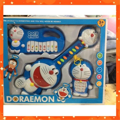Đồ chơi đàn guitar  Doraemon #1232 chạy bằng pin có đèn và âm thanh