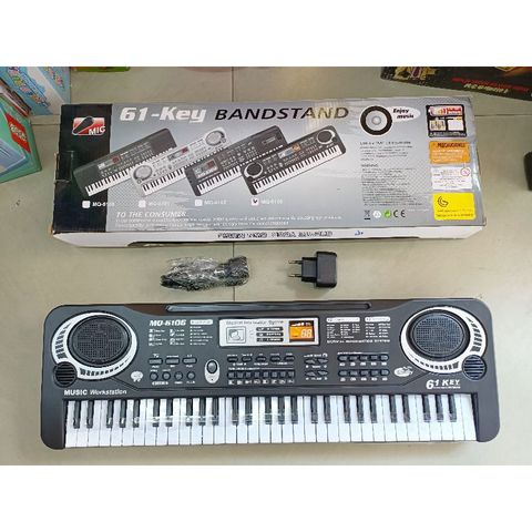 Hộp Đàn ELECTRONIC KEYBOARD kèm MIC hát có 61 phím nhạc và đèn phát sáng 6106