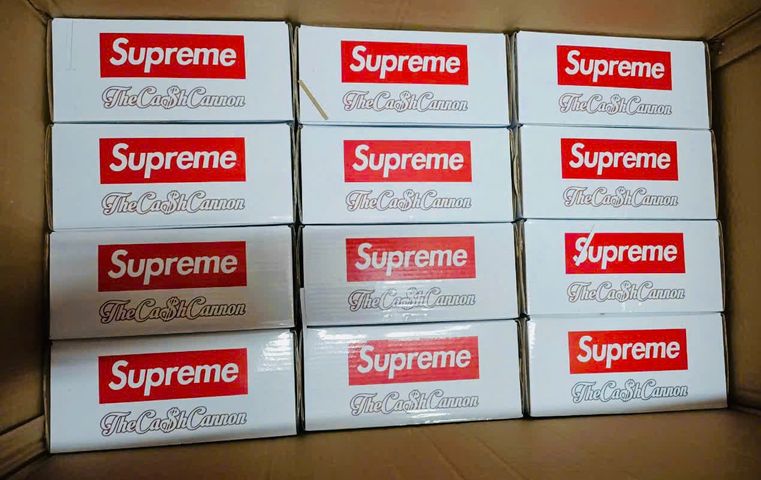Đồ chơi giải trí súng bắn tiền Supreme The Cash Cannon gun chạy bằng pin