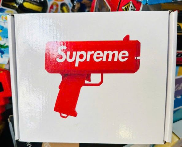 Đồ chơi giải trí súng bắn tiền Supreme The Cash Cannon gun chạy bằng pin