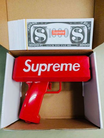 Đồ chơi giải trí súng bắn tiền Supreme The Cash Cannon gun chạy bằng pin