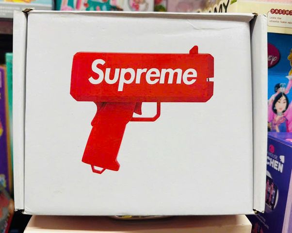 Đồ chơi giải trí súng bắn tiền Supreme The Cash Cannon gun chạy bằng pin