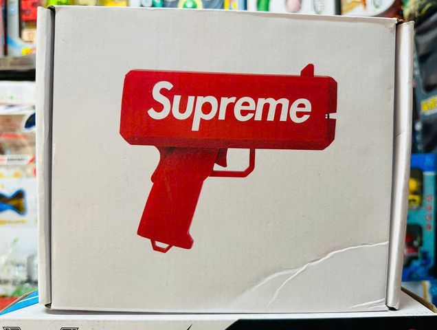 Đồ chơi giải trí súng bắn tiền Supreme The Cash Cannon gun chạy bằng pin