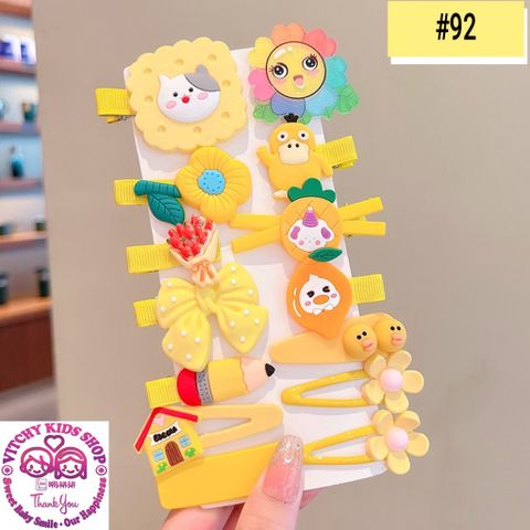 Set 14 kẹp tóc bé gái màu vàng họa tiết hoạt hình đáng yêu