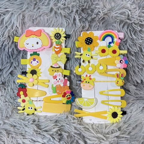 Set 14 kẹp tóc bé gái màu vàng họa tiết hoạt hình đáng yêu