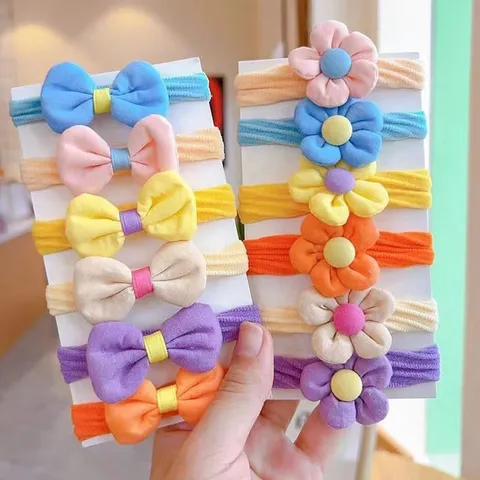 Thun buộc tóc cho bé gái Set 6 dây cột tóc hình nơ, bông hoa nhiều màu đáng yêu