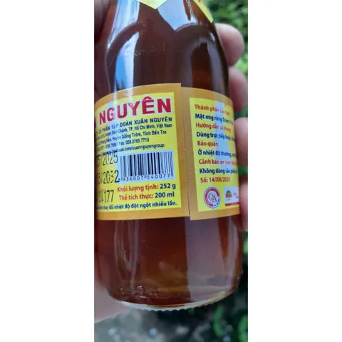 Mật ong nguyên chất Rừng Tràm Xuân Nguyên ( chai 252gr-200ml)