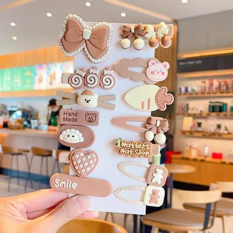 Set Kẹp Tóc  Cho Bé Gái 14 Chi Tiết Mẫu Mới Màu Tím Nhiều Họa Tiết Hoạt Hình Đáng Yêu