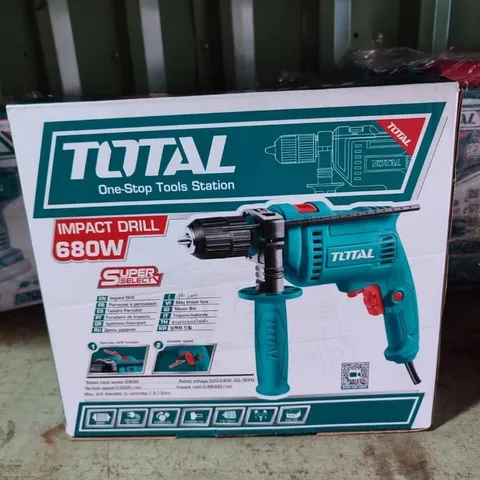 Máy khoan búa 13mm Total 680W TG1061356-2E - Tốc độ 0-3000rpm, Chức năng đảo chiều, Sức mạnh vượt trội cho mọi công việc sửa chữa