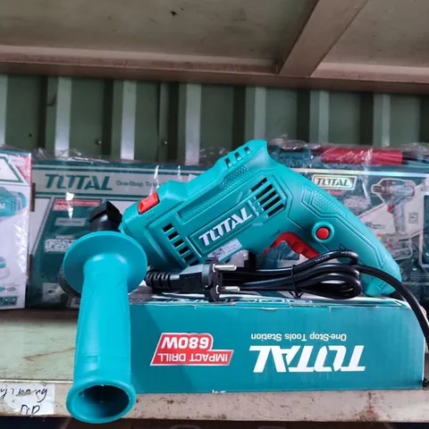Máy khoan búa 13mm Total 680W TG1061356-2E - Tốc độ 0-3000rpm, Chức năng đảo chiều, Sức mạnh vượt trội cho mọi công việc sửa chữa