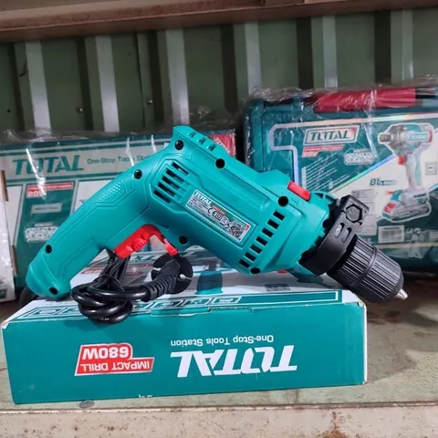 Máy khoan búa 13mm Total 680W TG1061356-2E - Tốc độ 0-3000rpm, Chức năng đảo chiều, Sức mạnh vượt trội cho mọi công việc sửa chữa