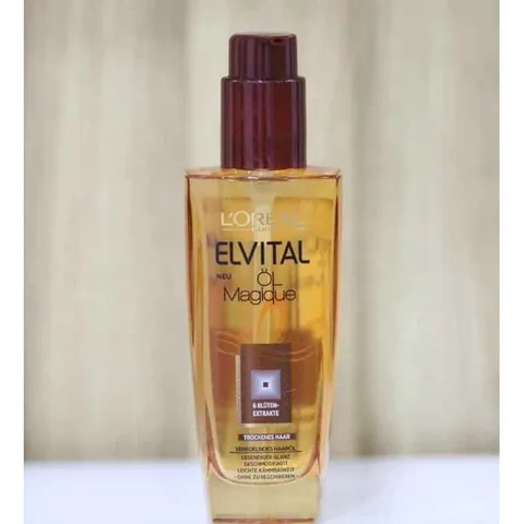 Hàng Đức Tinh dầu dưỡng tóc Loreal - Thiết kế chai dạng xịt rất dễ sử dụng