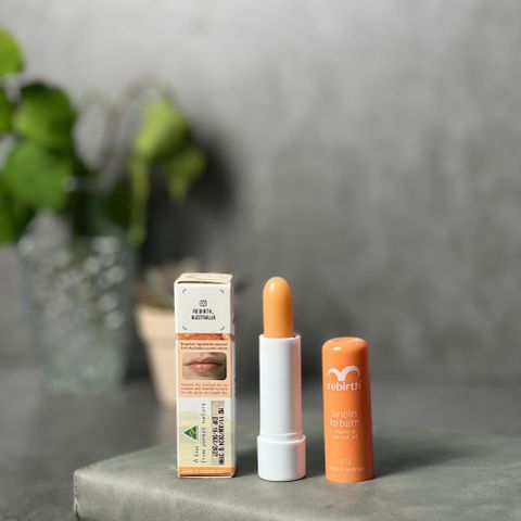 Son Dưỡng Môi Rebirth Úc - Dưỡng Ẩm, Trị Khô Nứt, Hương Vị Đào - Phù Hợp Với Trẻ Em và Phụ Nữ Mang Thai