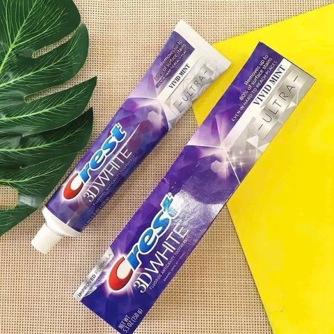 Kem đánh răng Crest 3D White Vivid Mint Ultra 147g - Làm trắng răng, bảo vệ sức khỏe răng miệng, hương bạc hà tươi mát
