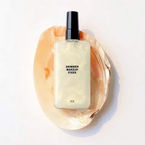 Xịt Khóa Nền 3CE Stylenanda Shimmer Makeup Fixer 95ml - Giữ lớp trang điểm bền lâu, tạo hiệu ứng bóng nhẹ, hoàn hảo cho mọi loại da.