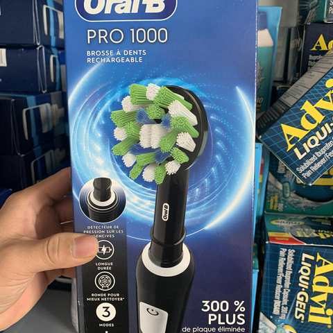 Bàn chải điện Oral-B Pro 1000 - Bàn chải đánh răng sạc, cảm biến áp suất & bộ hẹn giờ thông minh - Chăm sóc sức khỏe răng miệng hiệu quả