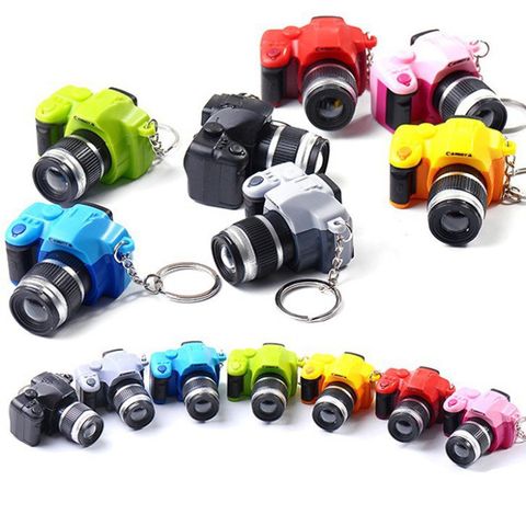 Móc Khóa Máy Ảnh Mini DSLR Đèn LED Sáng Tạo Có Âm Thanh - Phụ Kiện Đáng Yêu Cho Dân Nhiếp Ảnh