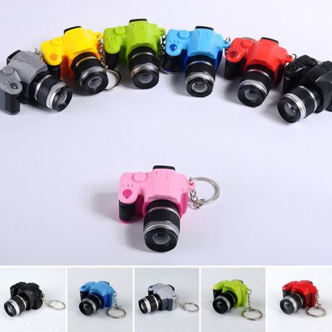 Móc Khóa Máy Ảnh Mini DSLR Đèn LED Sáng Tạo Có Âm Thanh - Phụ Kiện Đáng Yêu Cho Dân Nhiếp Ảnh