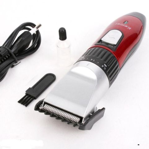 Tông Đơ Cắt Tóc Trẻ Em Kemei 730 - An Toàn, Dễ Sử Dụng, Kèm Dụng Cụ Lấy Ráy Tai Có Đèn - Thích Hợp Cho Gia Đình