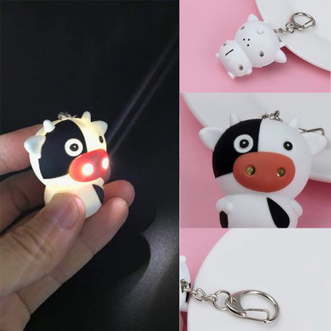 Móc Khóa Phát Sáng LED Có Nhạc Hình Bò Sữa Đáng Yêu - Móc Khóa Đèn Pin 3 in 1 Thú Vị Cho Fan Cá Tính